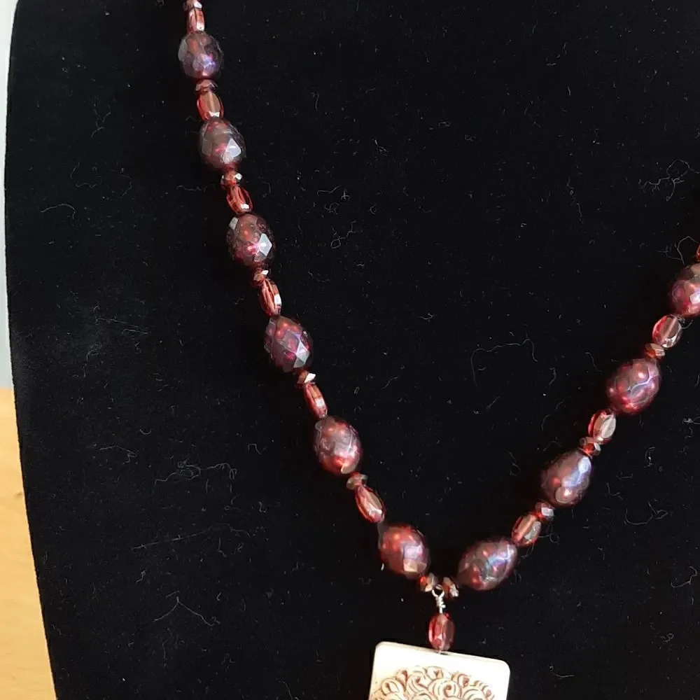 Artisan carter Wells purple beaded necklace with bone pendant
